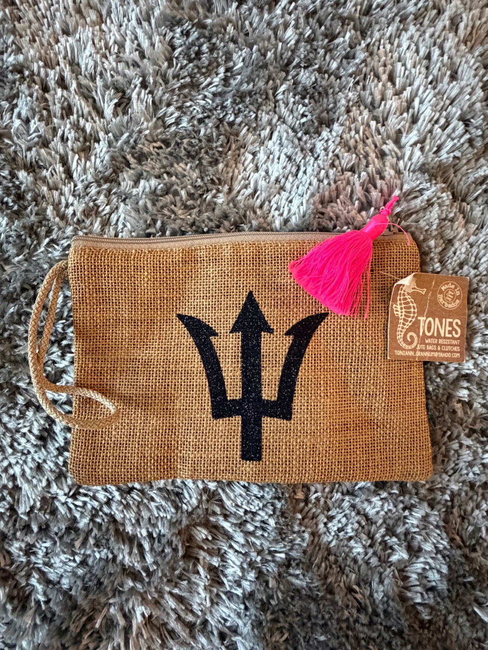 Tones Natural Jute Wristlet Clutch with Black Emblem and Pink Tassel
